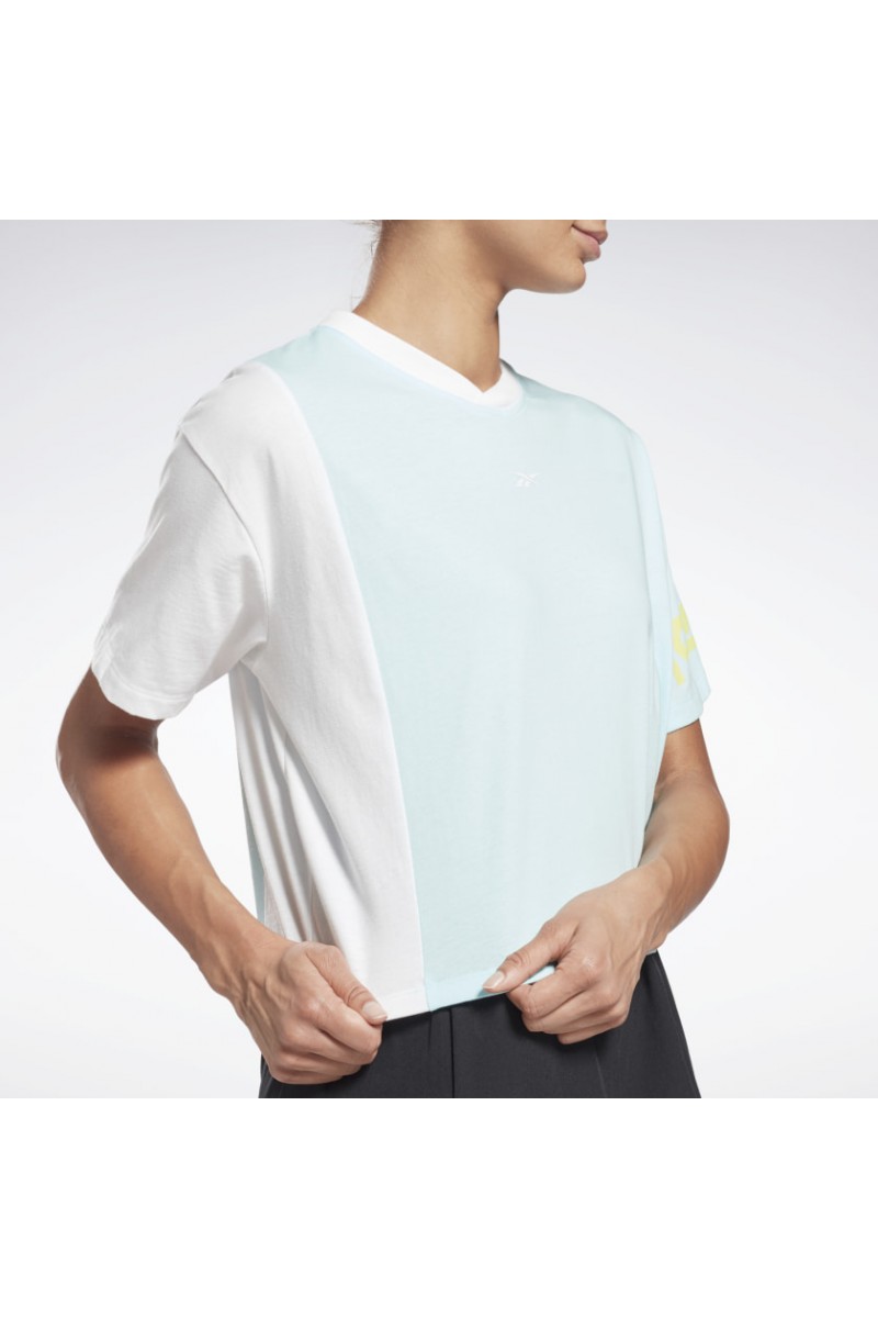 POLERA REEBOK MUJER CROP LINEAR VERDE POLERA REEBOK MUJER CROP LINEAR VERDE