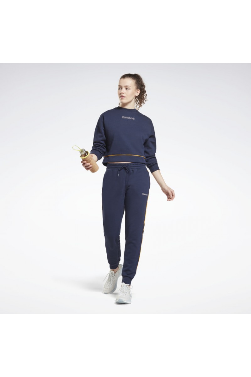 POLERÓN REEBOK MUJER PIPING CREW AZUL POLERÓN REEBOK MUJER PIPING CREW AZUL