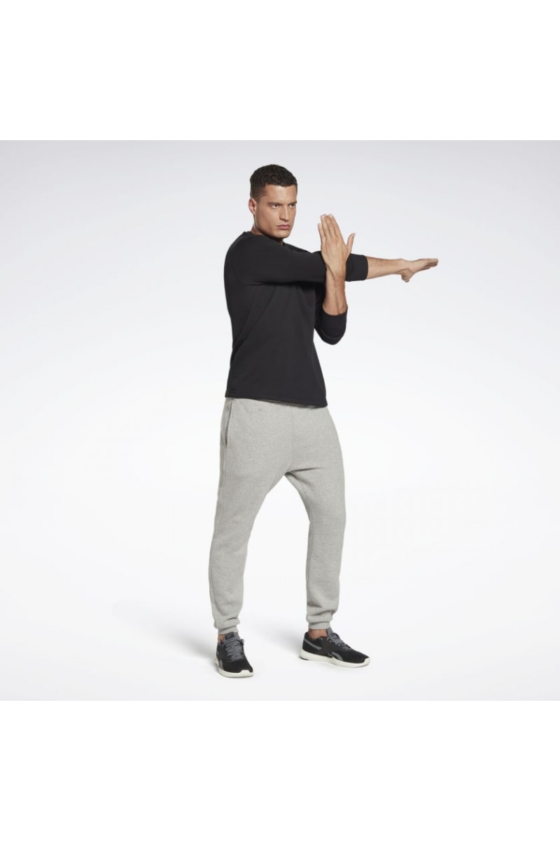 POLERÓN REEBOK HOMBRE PIPING CREW NEGRO POLERÓN REEBOK HOMBRE PIPING CREW NEGRO