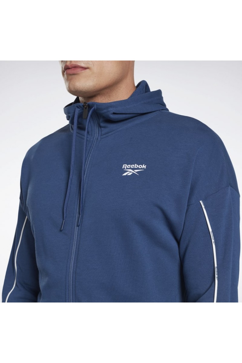 CHAQUETA REEBOK HOMBRE PIPING FZ AZUL CHAQUETA REEBOK HOMBRE PIPING FZ AZUL