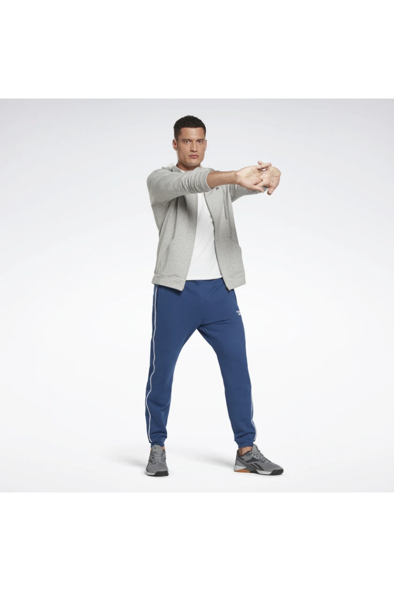 POLERÓN REEBOK HOMBRE WORKOUT READY ZIP PIPING GRIS POLERÓN REEBOK HOMBRE WORKOUT READY ZIP PIPING GRIS